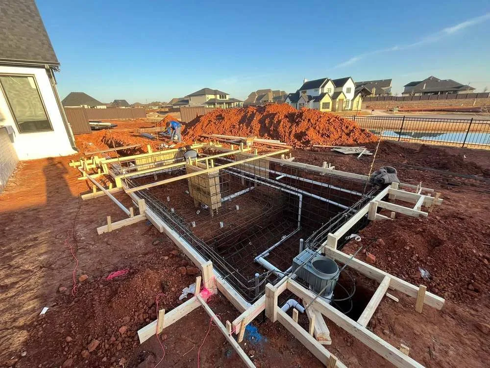 Gunite pool dig with forms, rebar and plumbing set in Oklahoma
